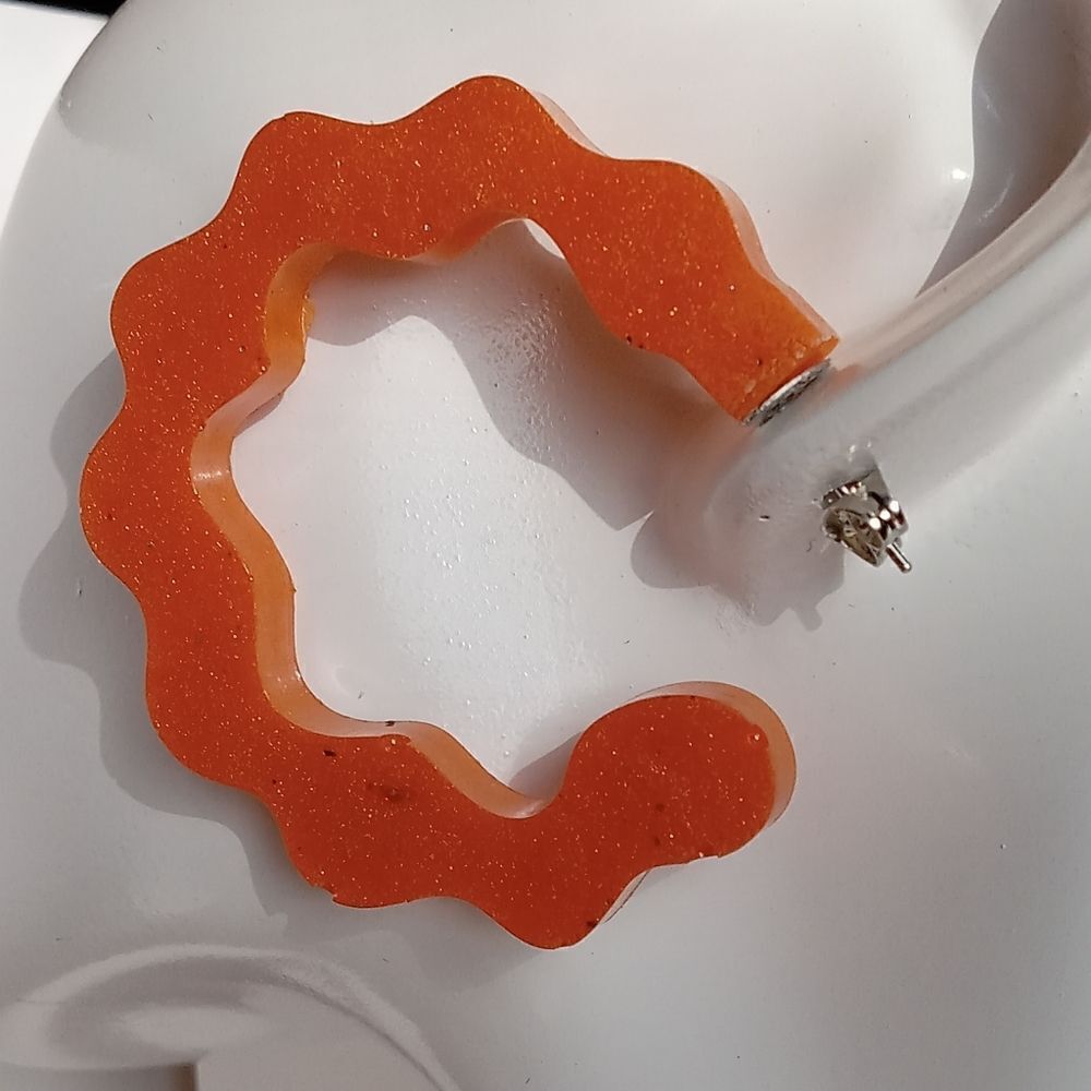 Orange resin hoop earrings